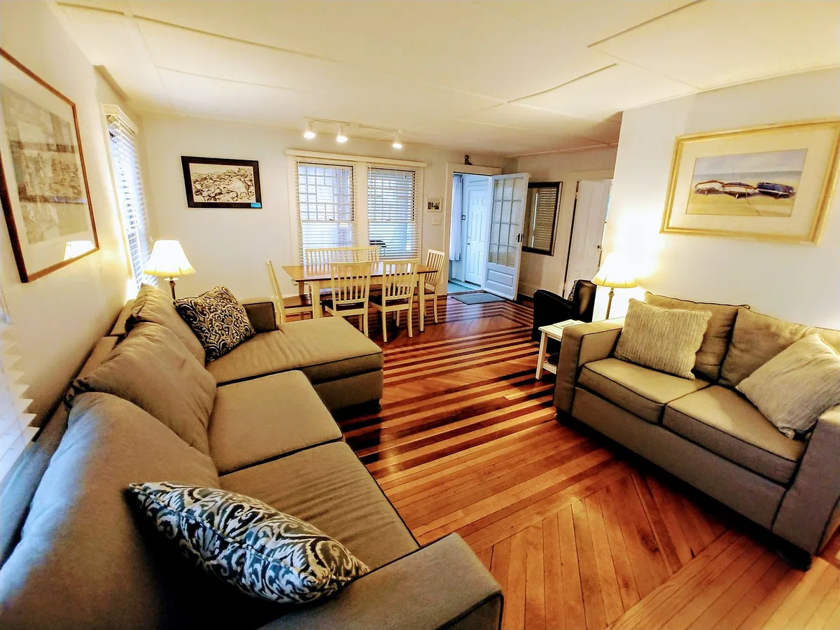 Bright living room with hardwood floors and comfortable seating